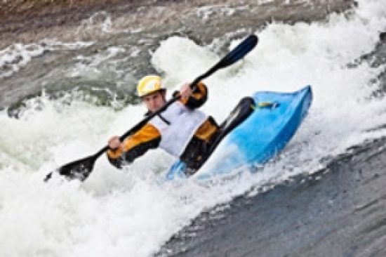 Man-kayaking-in-the-flow