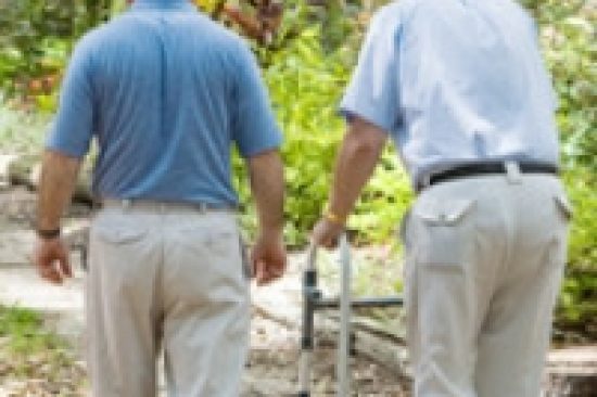 Son-elderly-father-strolling