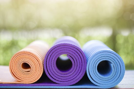 rolled-up-yoga-mats-exercise