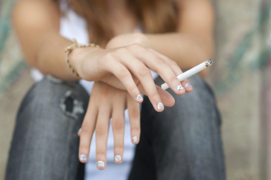 teen-smoking-cigarette-quit-tobacco21-lawsiStock_000023225544_Medium